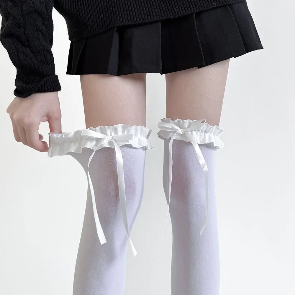 1 paire de bas doux, en dentelle, nœud, cuissardes