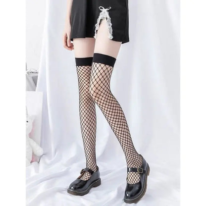 Chaussettes longues sexy noires et blanches au-dessus du genou